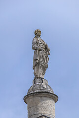 Louis-XVI column in Nantes (1823), installed in center of Place Marechal-Foch - column twenty-eight meters high, surmounted by a statue of King of France Louis XVI. Nantes, Loire Atlantique, France.