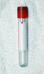 Empty test tube on white material
