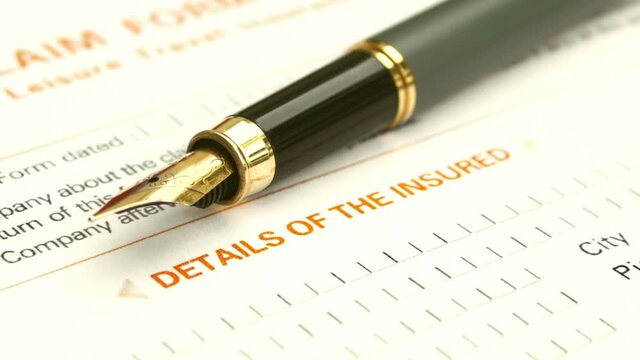 Close up of insurance form dolly shot