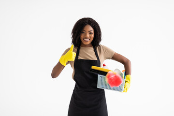 Young african woman with degergent basket with thumbs up isolated on white background