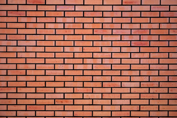 The brick wall is red. Background of bricks.