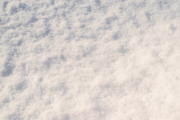 Loose white, sparkling snow. Winter snowy natural background, wallpaper.