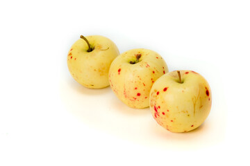 yellow apples on a white background