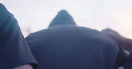 Man Is Put In Hand Cuffs, Arrest By Two Police Officers, Cops, Under Arrest. Hands Behind Back, Walking, Perp Walk