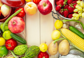 mixed fruits on wooden background