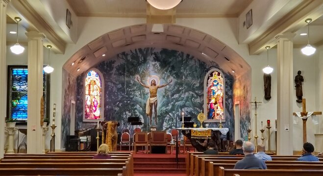 St. Rose de Lima Catholic Church interior with the Christ in the Oaks Mural in Bay St. Louis, Mississippi, painted by Auseklis Ozols.