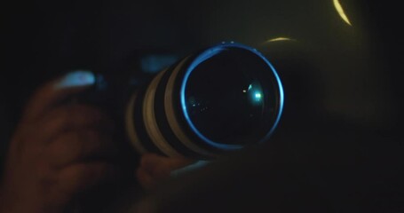 Spy, Paparazzi or Detective in the Car, Shooting On Camera. Night Time Stalking, Long Lens, Secretive Photography