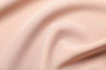 Texture of color fabric with folds as background, closeup
