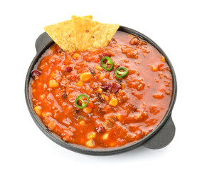 Frying pan with delicious chili con carne and nachos on white background