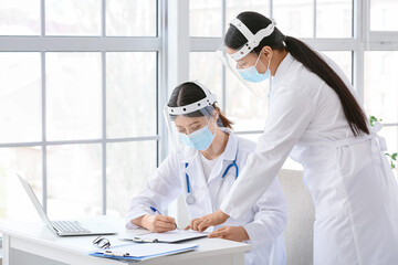 Female Asian doctors working in clinic