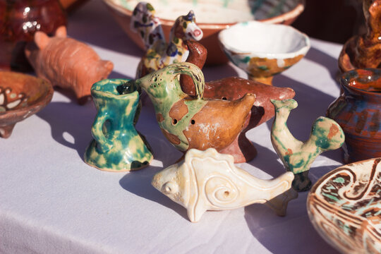 Ukrainian clay figurines, whistles and dishes at the exhibition. Ukraine