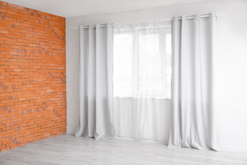 Light curtains in modern empty room