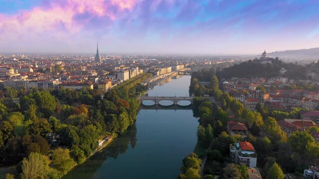 Turin city skyline aerial view fly over city downtown torino, turin italy drone footage.