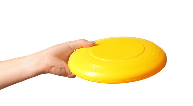 Woman holding frisbee disk on white background