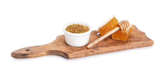 Bowl of bee pollen and honey combs on white background