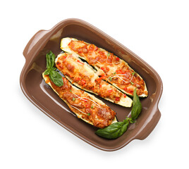 Baking dish with meat stuffed zucchini boats on white background