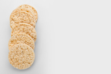 Puffed rice crackers on white background