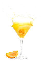 Glass of tasty orange margarita with splashes on white background