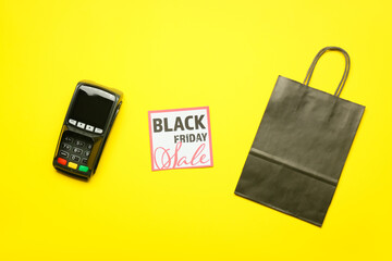 Shopping bag, payment terminal and card with text BLACK FRIDAY SALE on color background
