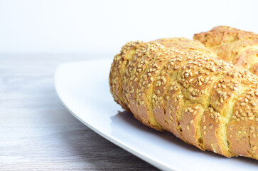 Close up, slice. Chia bread, rich in omega three, healthy, beneficial for our body and characteristic of its yellow color and spongy texture.