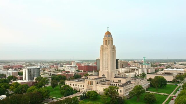 Slow Forward Motion Past Nebraska State Capitol. The Nebraska State Capitol Is The Seat Of Government For The U.S. State Of Nebraska And Is Located In Downtown Lincoln.