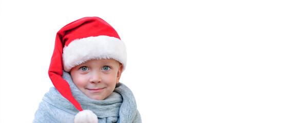 Boy 3 years old in a Santa hat on white isolated background, New Year, Christmas