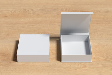 White opened and closed square folding gift box mock up on wooden background. Front view.