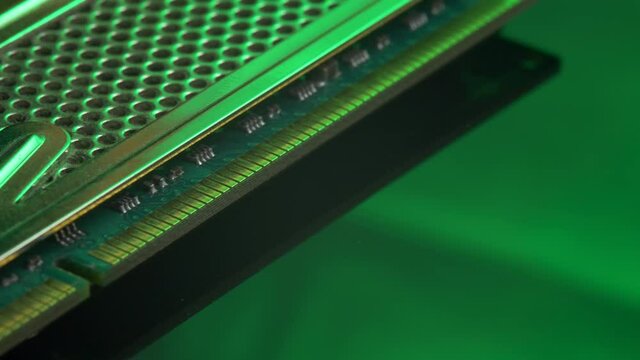PC memory module with contact pins. Heat spreader transfer energy to heat sink or exchanger. Random Access Memory abbreviated as DDR SDRAM. Computer hardware, industrial and electronic concept