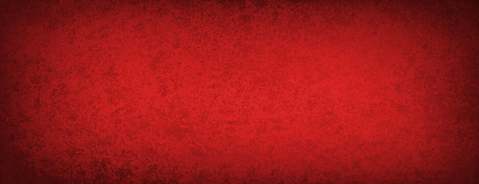Christmas red background texture, dark red border and bright red center with old vintage texture grunge and grain, old red paper with dark black vignette border