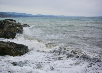 View of the stormy sea in the city of Alushta Crimea