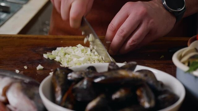 Process of mediterranean dish preparation. Fresh Mollusks Fish Shell Shrimp. Cooking Seafood. Slow Motion Footage.