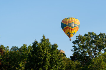 Hot Air Balloon Over Trees in Ithaca