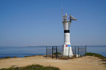 Mermerburnu lighthouse on a high hill in Bozcaada        