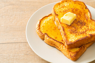 French toasted with butter and honey