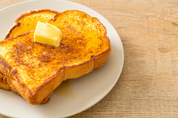French toasted with butter and honey
