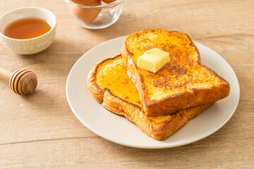 French toasted with butter and honey