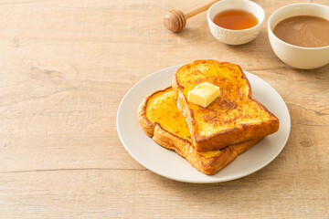 French toasted with butter and honey