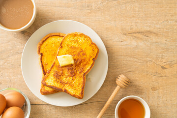 French toasted with butter and honey