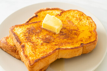 French toasted with butter and honey
