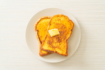 French toasted with butter and honey