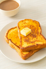 French toasted with butter and honey