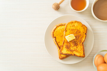 French toasted with butter and honey