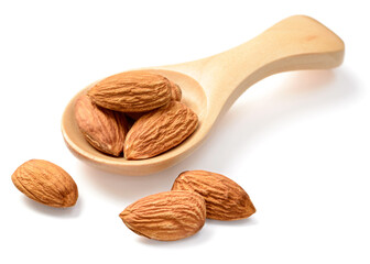 almond nuts in the wooden spoon, isolated on the white background