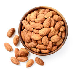 almond nuts in the wooden bowl, isolated on the white background, top view