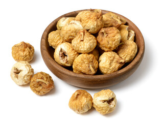 close up of dried fig fruits in the wooden bowl, isolated on the white background
