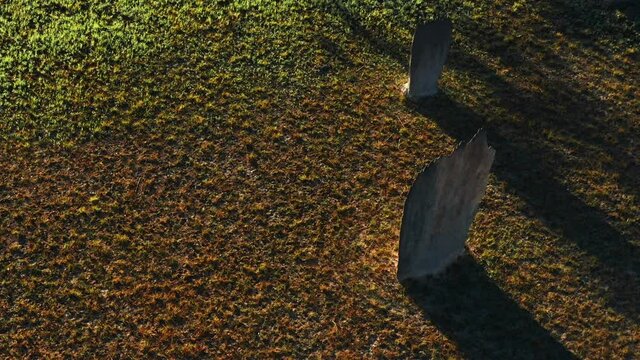 Illuminated Standing Magnetic Termite Mounds At Sunset In Litchfield National Park, Northern Territory, Australia. - Aerial Drone