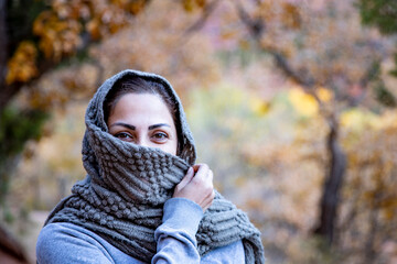 Woman covering her face