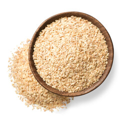 uncooked wheat germ in the wooden bowl, isolated on the white background, top view