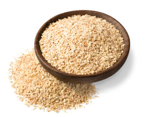 uncooked wheat germ in the wooden bowl, isolated on the white background
