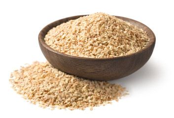 uncooked wheat germ in the wooden bowl, isolated on the white background